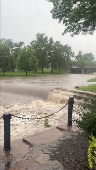 A view shows flooded creek, in Kansas City