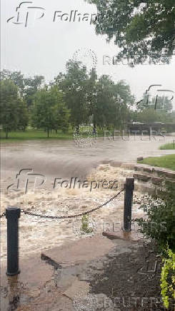 A view shows flooded creek, in Kansas City