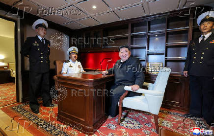 North Korean leader Kim Jong Un visits a Choe Hyon-class destroyer
