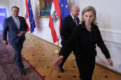 Chancellor Stocker, Vice-Chancellor Babler and Foreign Minister Meinl-Reisinger walk into a cabinet meeting in Vienna