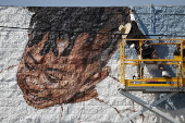 Artist works on new mural for the Altadena community in the months following the Eaton fire