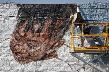 Artist works on new mural for the Altadena community in the months following the Eaton fire