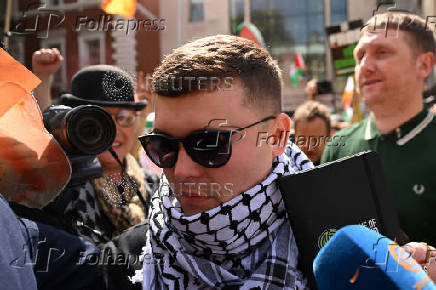 Member of Irish rap group Kneecap in UK court on terrorism charge