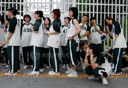 'Squid Game' characters parade through central Seoul