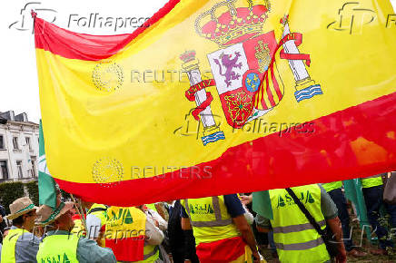 Farmers protest against proposed cuts to Common Agricultural Policy (CAP) funding, in Brussels