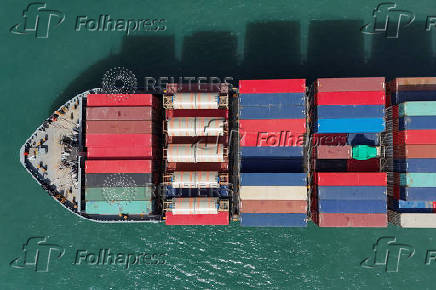 A drone view shows a cargo ship at Kwai Tsing Container Terminals in Hong Kong