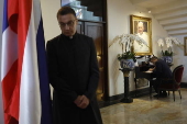 People sign condolence book at Vatican embassy in Bangkok following Pope Francis's death