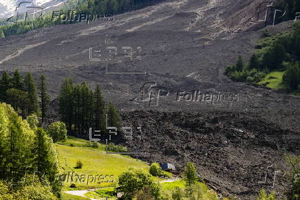 Swiss village almost buried after collapse of glacier