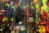 Roadside shop sells ornaments ahead of Eid al-Adha in Peshawar
