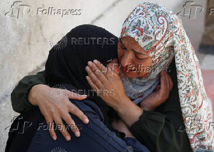 Funeral for Palestinians killed by Israeli fire while seeking aid in northern Gaza