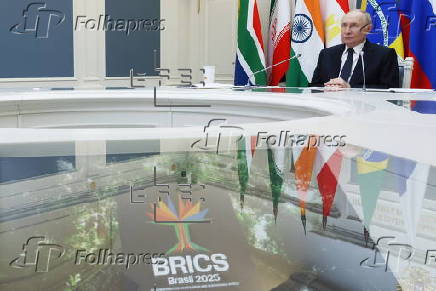 Russian President Vladimir Putin participates in a plenary session of the 17th BRICS Summit
