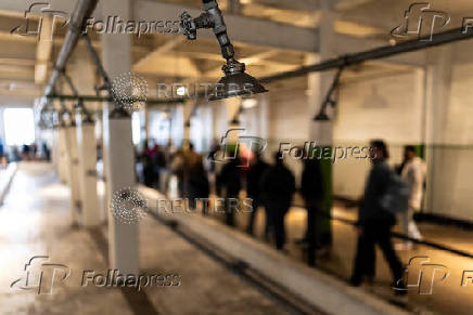 Visitors tour the Alcatraz prison complex located on Alcatraz Island in San Francisco Bay