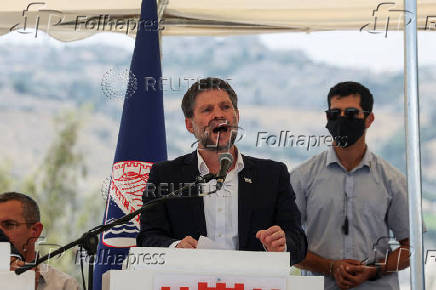 Israeli Finance Minister Smotrich speaks at a press conference regarding settlements expansion, near the Israeli settlement of Maale Adumim