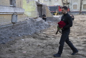 Ukrainian President Zelensky visits site of Russian missile strike in Kyiv
