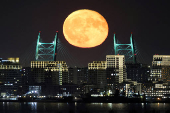 The full moon rises in Saint Petersburg