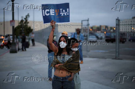 Protesters gather around the Los Angeles Federal Building after multiple detentions by ICE, in Los Angeles