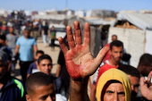 Visual story on the ordeal Gazans endure to get food under new aid distribution programme in Khan Younis