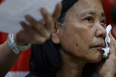 Chan Po-ying, chair of Hong Kong?s League of Social Democrats, reacts during a press conference to announce the party?s dissolution amid China?s national security law, in Hong Kong