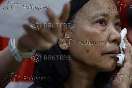 Chan Po-ying, chair of Hong Kong?s League of Social Democrats, reacts during a press conference to announce the party?s dissolution amid China?s national security law, in Hong Kong
