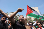 Demonstrators take part in a protest against hunger crisis in Gaza