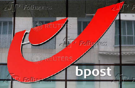 FILE PHOTO: The logo of Belgium's national postal deliverer bpost is pictured outside the company's headquarters in Brussels