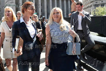 FILE PHOTO: Giuffre, an alleged victim of Epstein, walks after the hearing in the criminal case against him at Federal Court in New York