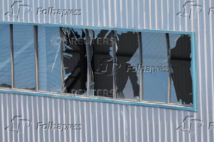 Damaged windows are seen near the site of the chemical plant explosion in Gaomi
