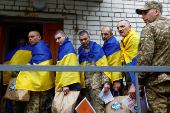 Ukrainian prisoners of war are seen as they return after a swap in an undisclosed location in Ukraine