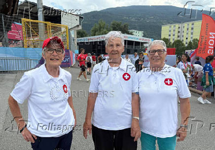 Former Swiss national team players Siggen, Copt and Juillard pose at Tourbillon stadium in Sion