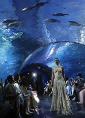 Recycled waste fashion show in Bangkok displays clothing created from trash