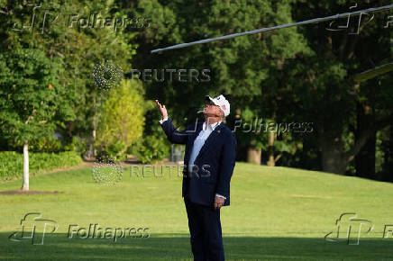 U.S. President Donald Trump arrives at the White House in Washington