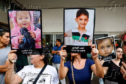 People take part in a protest against what organizers call 