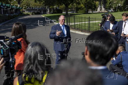 US Border Czar Tom Homan talks with news media outside the West Wing