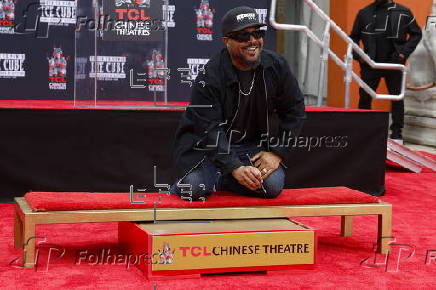 Ice Cube is honored at handprint and footprint ceremony in Los Angeles