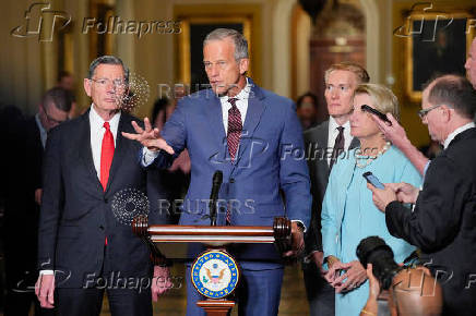 U.S. Senate Majority Leader John Thune talks to reporters on Capitol Hill