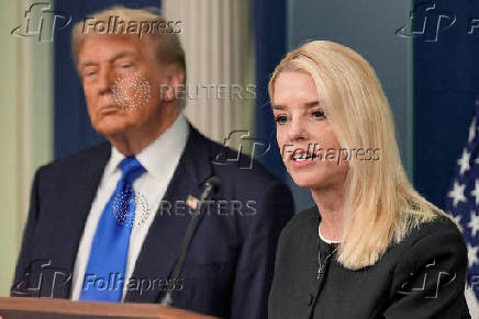 FILE PHOTO: President Donald Trump and Attorney General Pam Bondi are shown in the White House