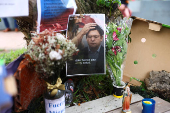 Tributes at place where Colombian Senator Uribe was shot during campaign event, in Bogota