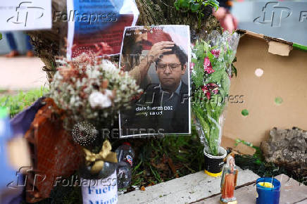 Tributes at place where Colombian Senator Uribe was shot during campaign event, in Bogota