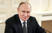 Russian President Vladimir Putin meets with heads of international news agencies in Saint Petersburg