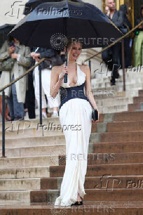 Guests arrive at Schiaparelli Haute Couture Fall/Winter 2025-2026 show in Paris