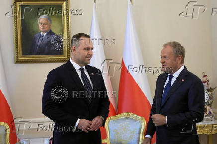Polish PM Tusk and President Nawrocki attend first official meeting, in Warsaw