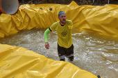 Ukrainian war veteran attends a race with obstacles in Vynnyky, ouside of Lviv