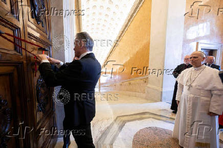 Pope Leo XIV looks on as the Apostolic Palace is unsealed, at the Vatican