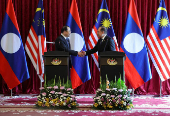 The Prime Minister of Laos met his Malaysian counterpart during his visit to Malaysia