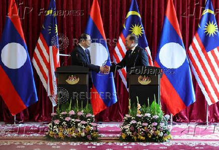 The Prime Minister of Laos met his Malaysian counterpart during his visit to Malaysia