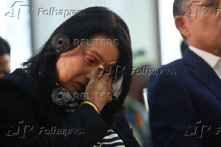 People gather for a religious service for the recovery of Senator Miguel Uribe Turbay at the Colombian Congress, in Bogota