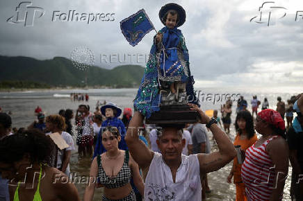 People celebrate Saint John the Baptist, in Ocumare de la costa
