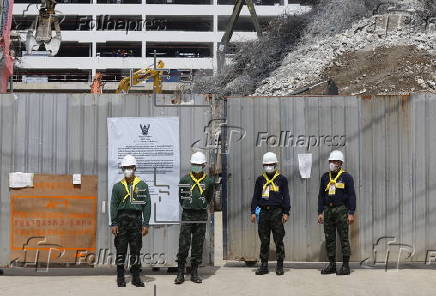 Rescuers search for survivors after signs of life detected under Bangkok building rubble