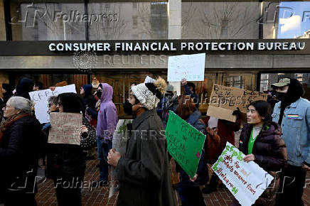 FILE PHOTO: CFPB supporters rally in Washington