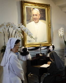 People sign condolence book at Vatican embassy in Bangkok following Pope Francis's death